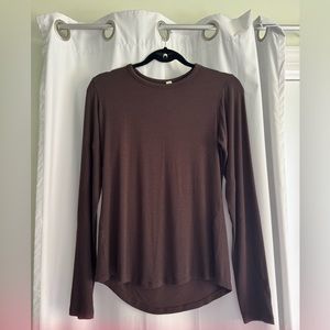 Women’s dark brown size 10 lululemon long sleeve shirt. NWOT.